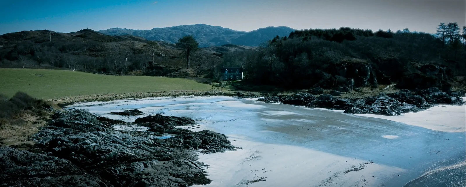 Frozen bay below the cottage at first light